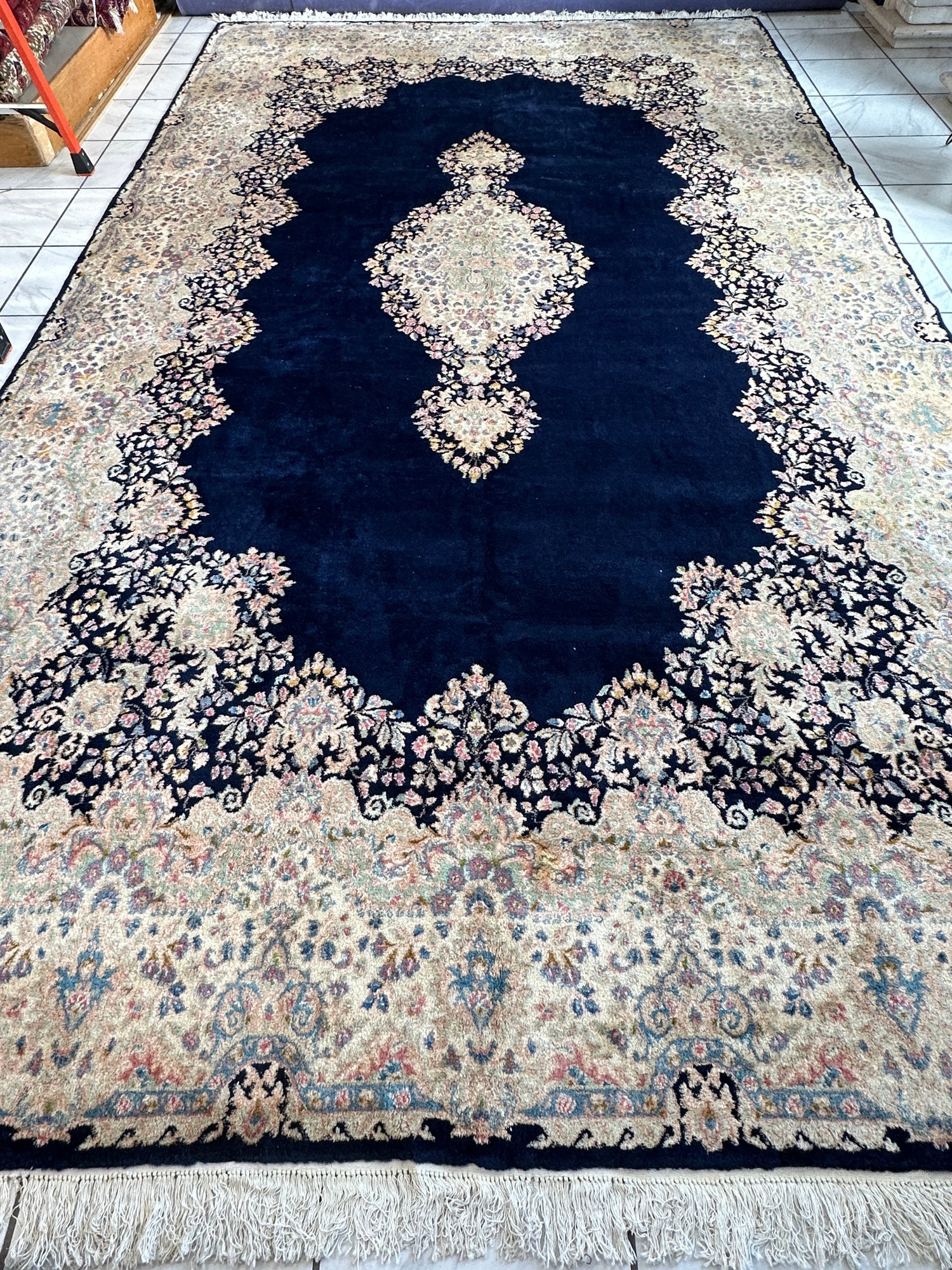 Palace-Size Vintage Royal Kirman Wool Rug – 9’9” x 17’2” – Hand-Knotted Persian Elegance with Deep Navy Field