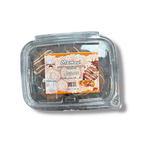 Albasha Mamoul Filled With Sweet Dates Dipped In Rich Chocolate